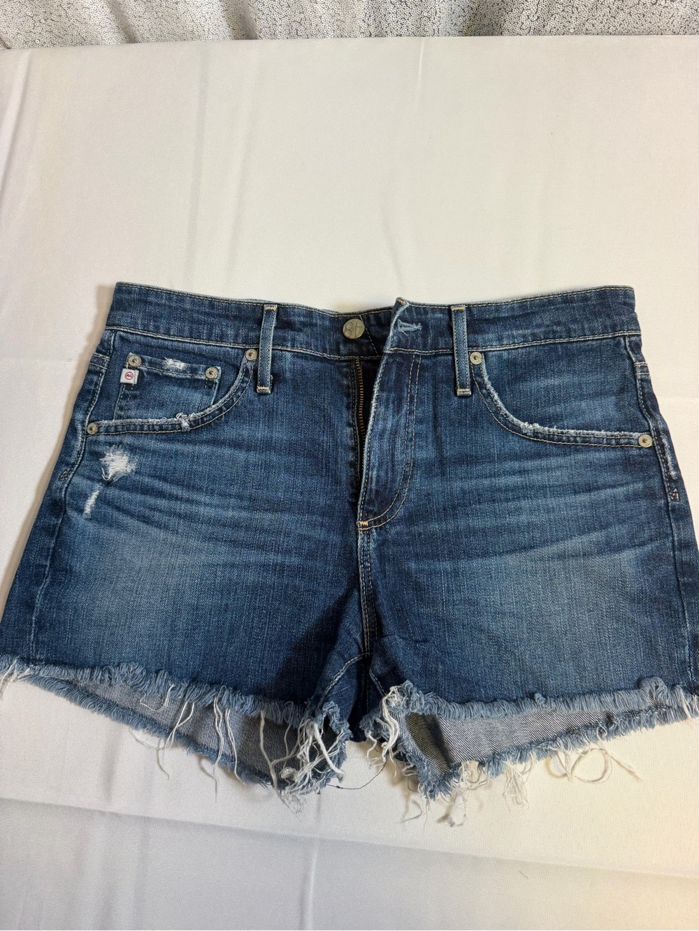 Ag Adriano Goldschmied Distressed Medium Blue Denim Cutoff Shorts